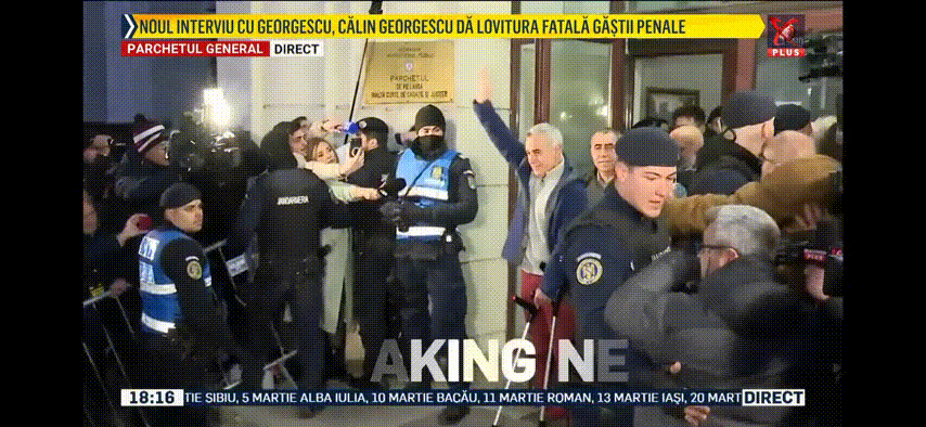 News TV footage showing Georgescu standing outside the door, waving to the crowd of his fans, and doing a nazi salute.